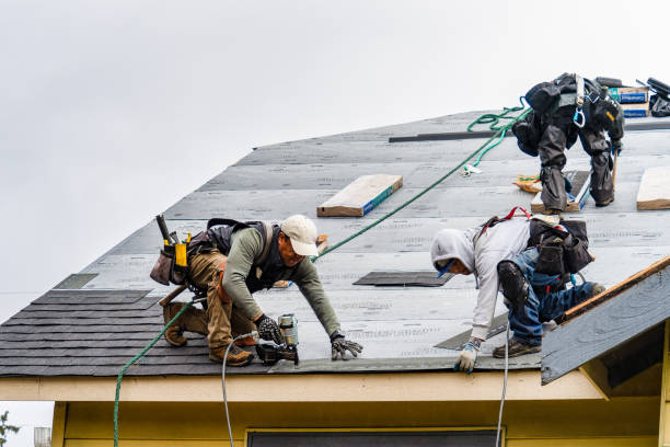 Professional Roofing technician working in Myra, WV